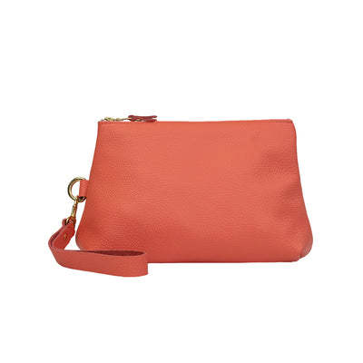 Handmade Leather Clutch Bag in Coral featuring Zipper Closure by Kerry Noel. 