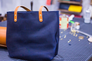 Learn how to clean for genuine leather handbags made in the USA by Kerry Noël!
