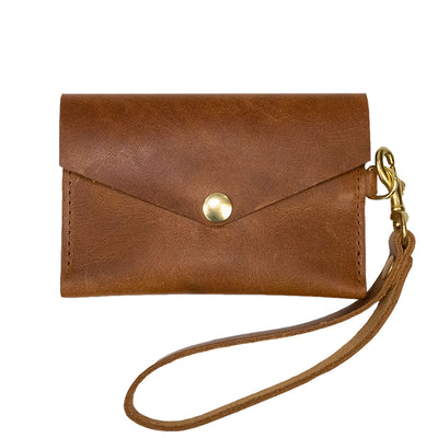 Closed View of Kerry Noel snap closure wallet with leather card case wallet womens capacity in English.
